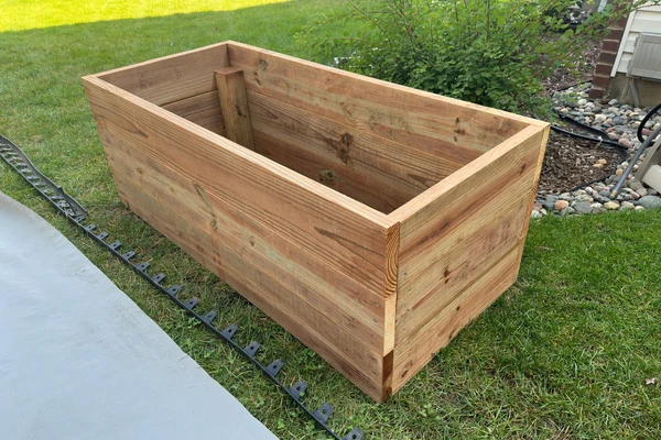 view of a completed raised bed base before attaching a privacy panel to the back.